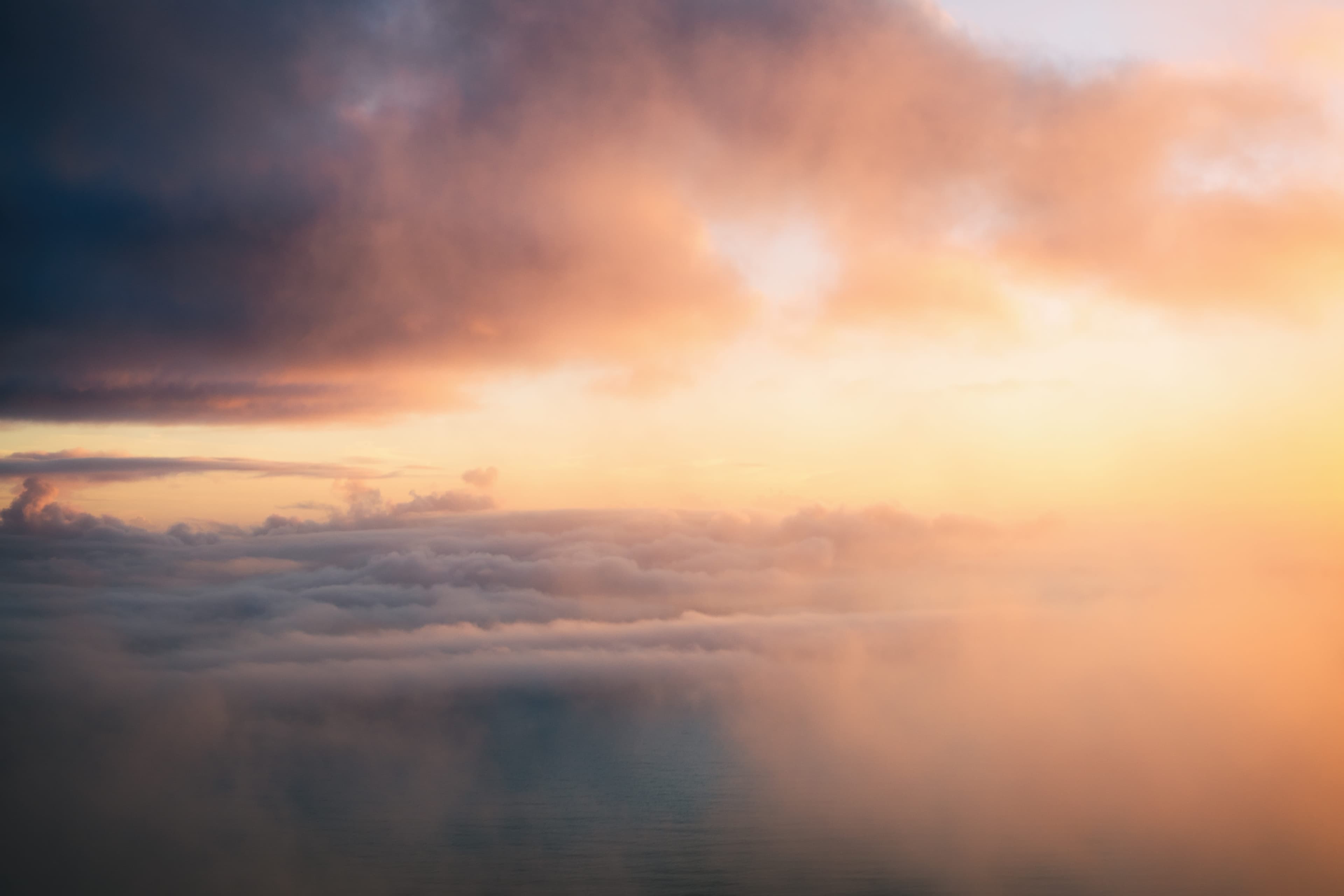 Sunset over clouds