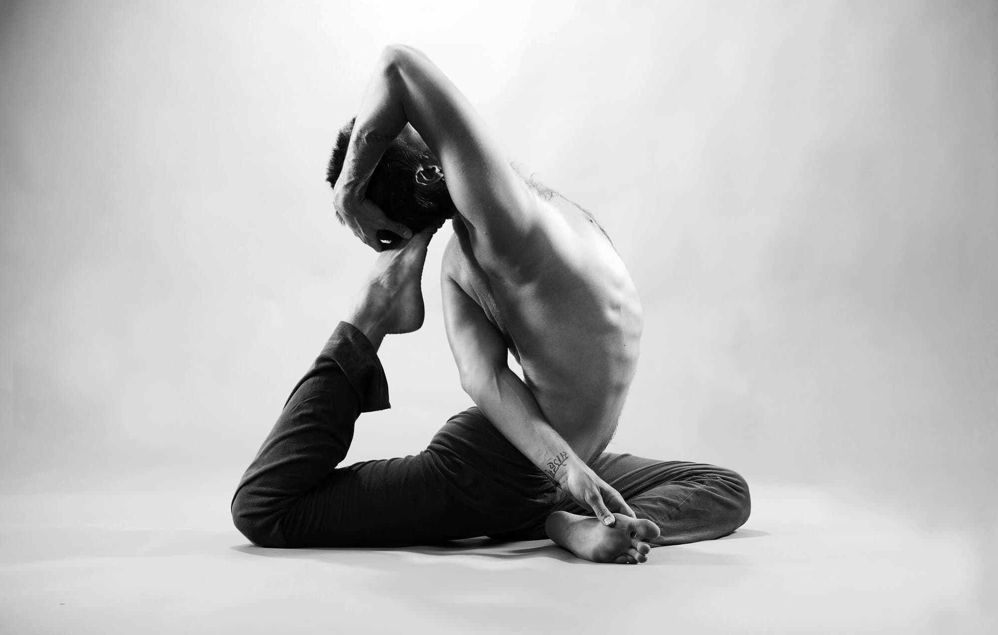 Jason Bowman, San Francisco yoga teacher, in an advanced yoga pose